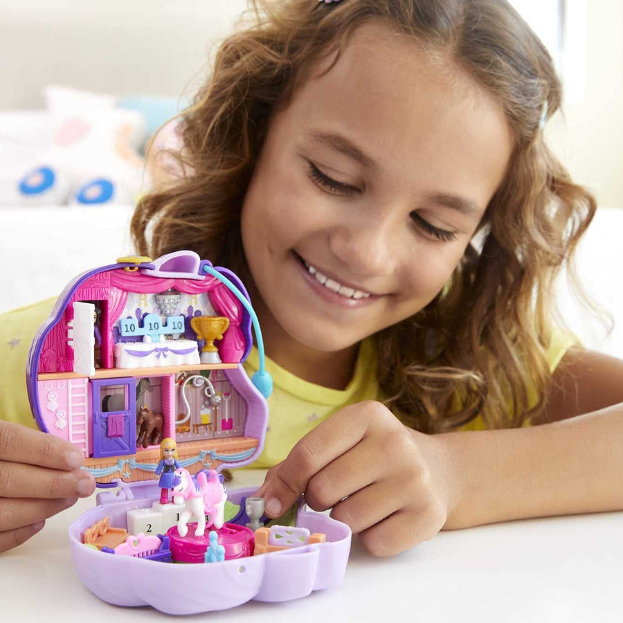 Polly Pocket Jumpin’ Style Pony Compact with Horse Show Theme, Micro Polly Doll & Friend, 2 Horse Figures (1 with Saddle & Tail Hair), Fun Features & Surprise Reveals, Great Gift for Ages 4 & Up