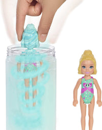 Barbie Chelsea Color Reveal Doll with 6 Surprises: 4 Bags with Cover-Up, Shoes, Towel & Accessory; Water Reveals Marble Blue Doll’s Look & Color Change on Hair; Sand & Sun Series
