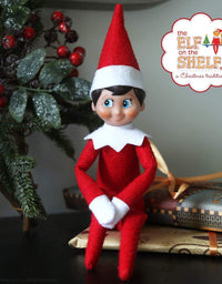 The Elf on the Shelf: A Christmas Tradition Girl Dark Tone - Includes Doll, Book and box.
