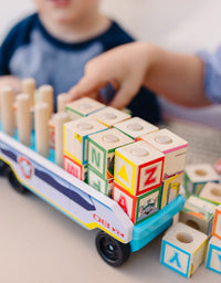 Melissa & Doug PAW Patrol Wooden ABC Block Truck (33 Pieces)
