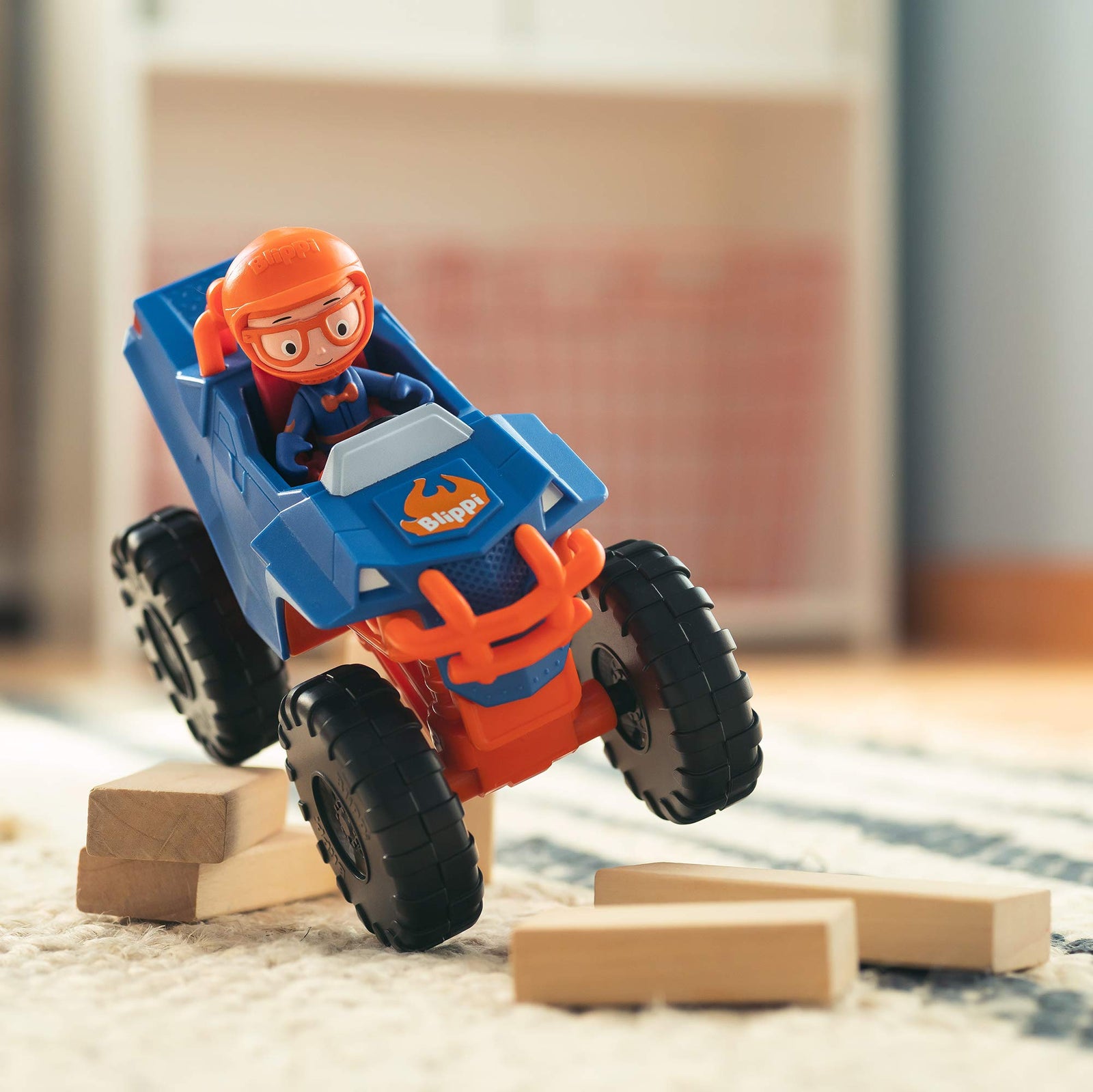 Blippi Monster Truck Mobile - Mini Vehicle with Freewheeling Features Including 2” Character Toy Figure and Cool Hydraulics - Imaginative Play for Toddlers and Young Children