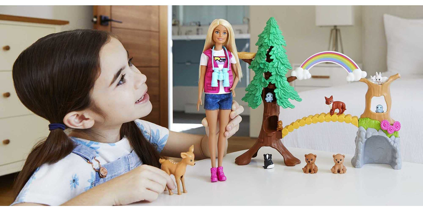 Barbie Wilderness Guide Interactive Playset with Blonde Doll (12-in), Outdoor Tree, Bridge, Overhead Rainbow, 10 Animals & More, Great Gift for Ages 3 Years Old & Up