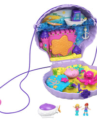 Polly Pocket Tiny Power Seashell Purse Compact with Wearable Strap, Fun Under-The-Sea Features, Micro Polly and Lila Mermaid Dolls, 2 Accessories & Sticker Sheet; for Ages 4 Years Old & Up
