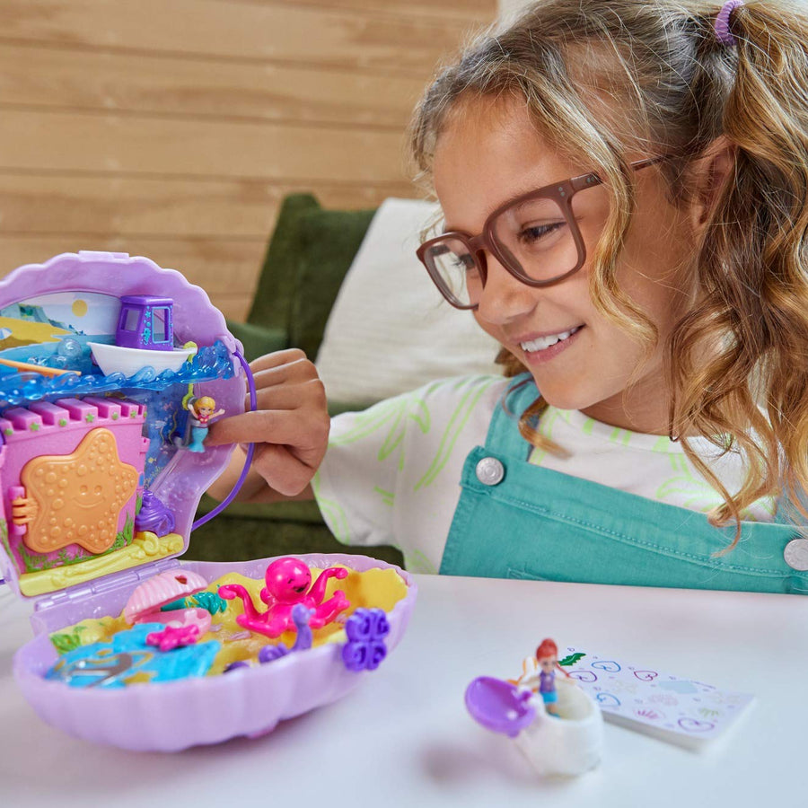 Polly Pocket Tiny Power Seashell Purse Compact with Wearable Strap, Fun Under-The-Sea Features, Micro Polly and Lila Mermaid Dolls, 2 Accessories & Sticker Sheet; for Ages 4 Years Old & Up