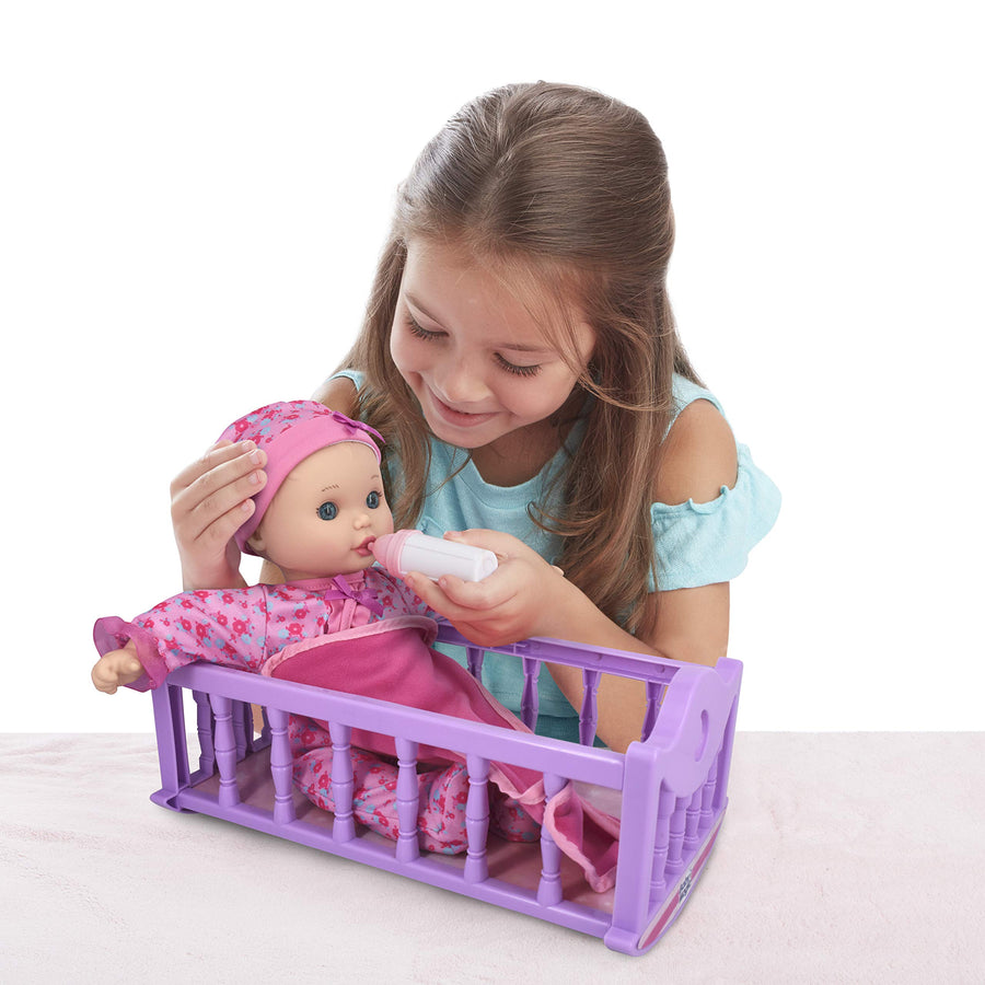 Baby Magic Crib Time Fun (6556), 12” Soft body baby doll, 6 different baby sounds, molded crib, accessories and bonus outfit. Age 2+, Caucasian [Amazon Exclusive]