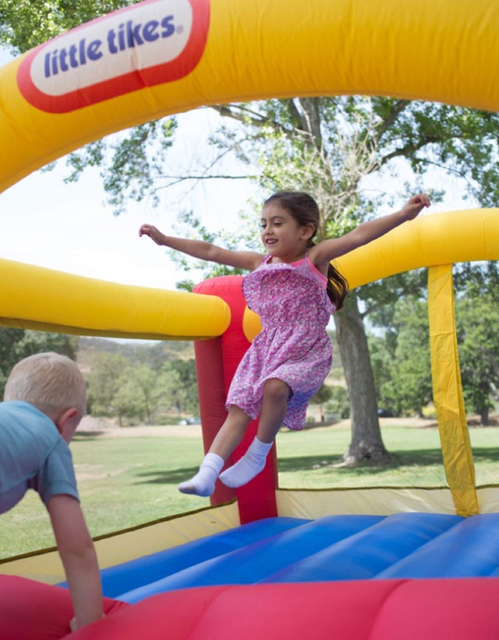 Little Tikes Jump 'n Slide Bouncer - Inflatable Jumper Bounce House Plus Heavy Duty Blower With GFCI, Stakes, Repair Patches, And Storage Bag 106.2 Inch x 137.7 Inch x 65.7 Inch Ages 3-8 Years