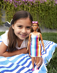 Barbie Loves The Ocean Beach-Themed Doll (11.5-inch Curvy Brunette), Made from Recycled Plastics, Wearing Fashion & Accessories, Gift for 3 to 7 Year Olds
