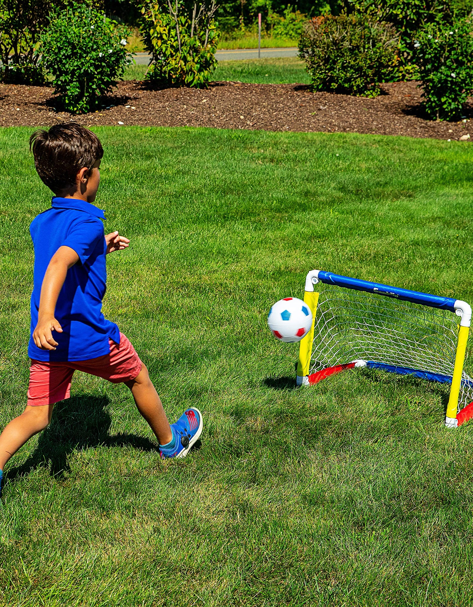 Franklin Sports Kids Mini Soccer Goal Set - Backyard/Indoor Mini Net and Ball Set with Pump - Portable Folding Youth Soccer Goal Set - 24" x 16" , Red/Blue/Yellow